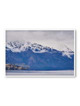 Cloud Drift fine art landscape print featuring snow-covered New Zealand mountains and foggy alpine terrain. Moody Queenstown photography wall art, perfect for winter interiors. Premium giclée print on archival paper. Ideal for modern home décor, minimalist design, and Scandinavian-style spaces. Available from Melbourne Print Studio, part of the Snowdrift Collection.