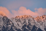 Cloud Ridge fine art landscape print featuring snow-covered New Zealand mountains and foggy alpine terrain. Moody Queenstown photography wall art, perfect for winter interiors. Premium giclée print on archival paper. Ideal for modern home décor, minimalist design, and Scandinavian-style spaces. Available from Melbourne Print Studio, part of the Snowdrift Collection.