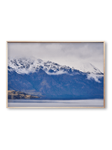 Cloud Drift fine art landscape print featuring snow-covered New Zealand mountains and foggy alpine terrain. Moody Queenstown photography wall art, perfect for winter interiors. Premium giclée print on archival paper. Ideal for modern home décor, minimalist design, and Scandinavian-style spaces. Available from Melbourne Print Studio, part of the Snowdrift Collection.